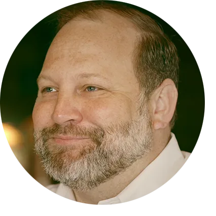Hector and Nena Chavez, owners of Orenco Station Grill, pose in front of their restaurant.